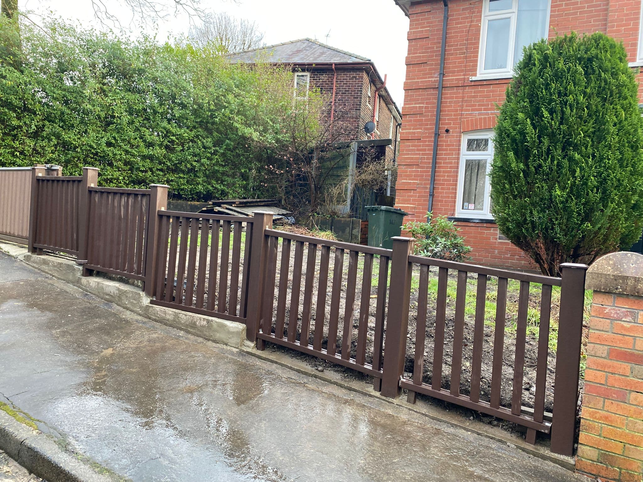 Fence line running the length of a rear boundary