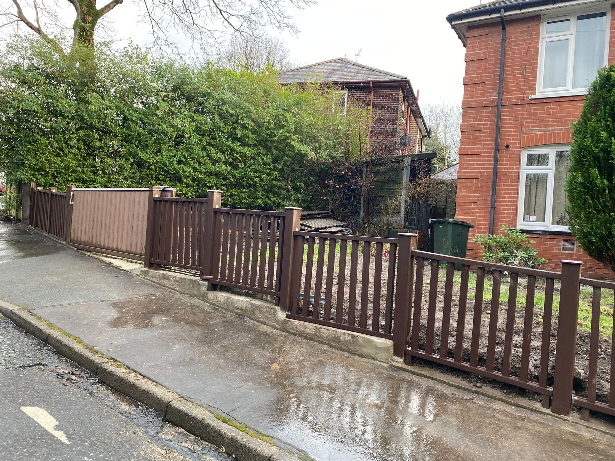 Completed fencing with concrete posts and gravel boards