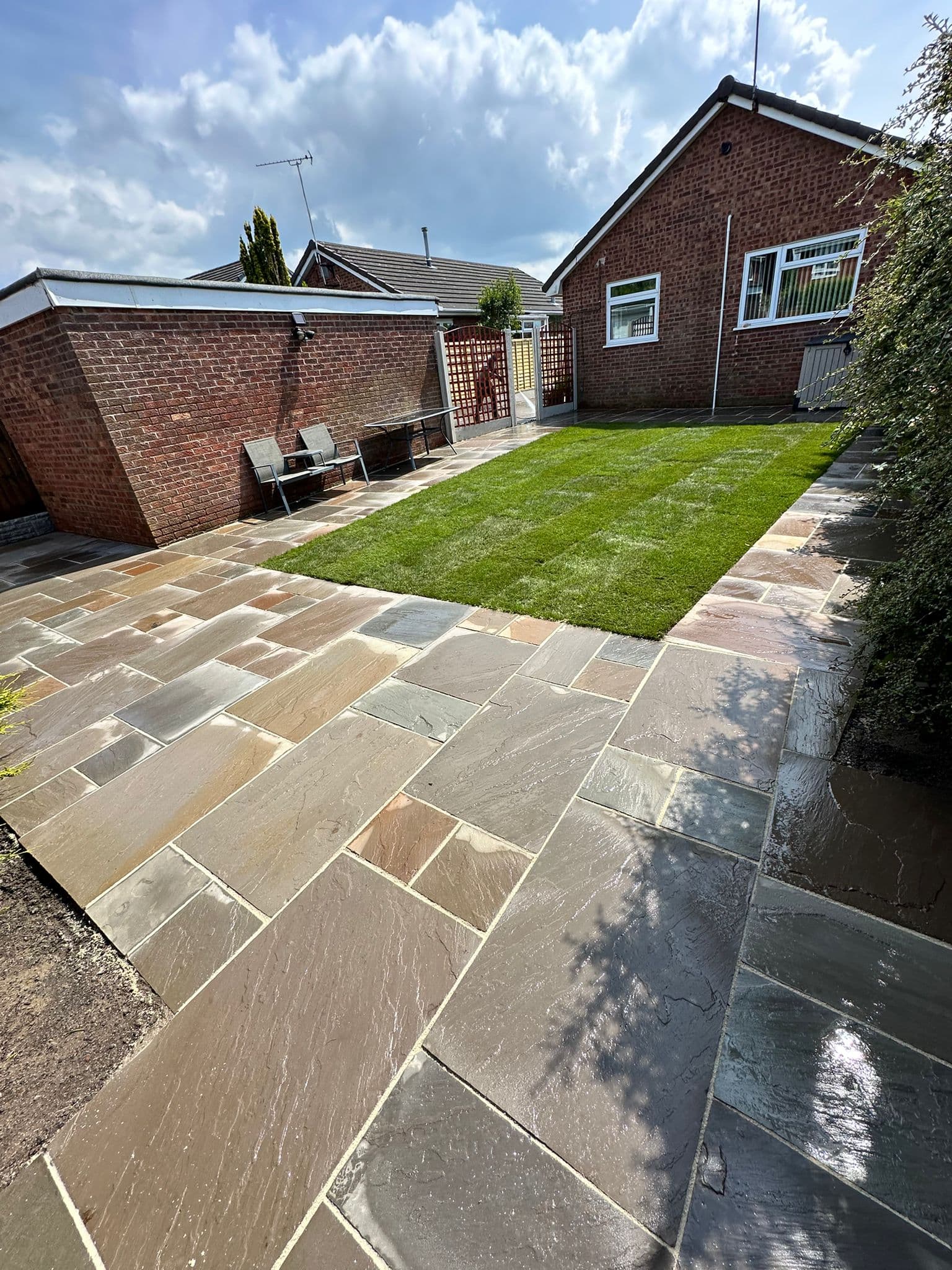 Indian sandstone patio showing the natural colour variation between slabs