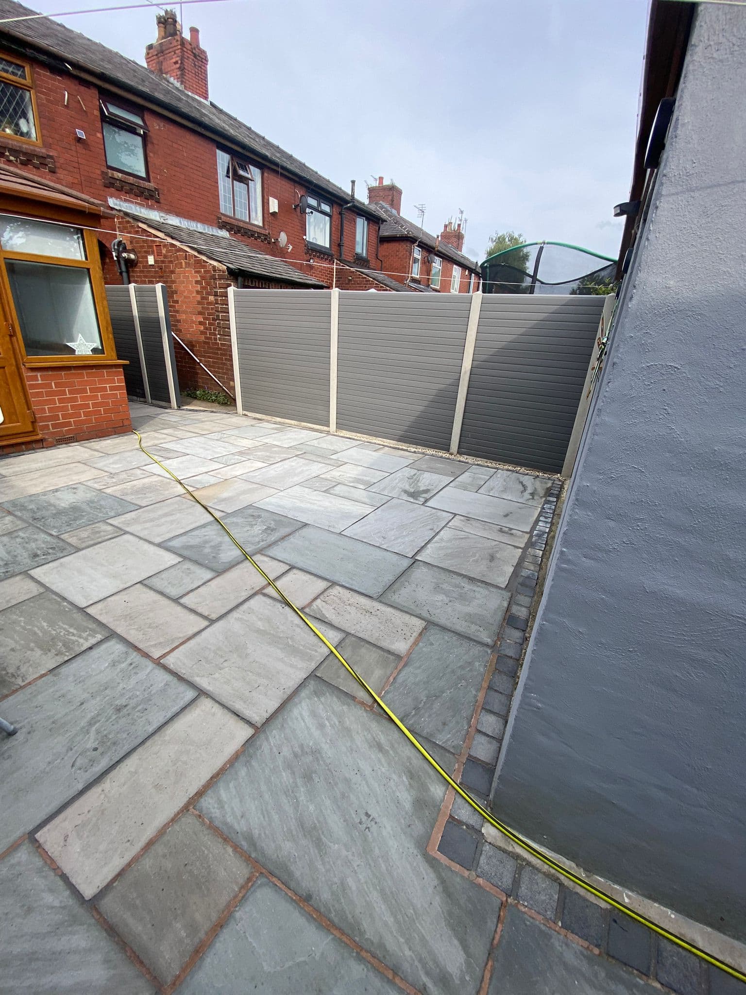 Indian stone paving laid in a mixed-size pattern