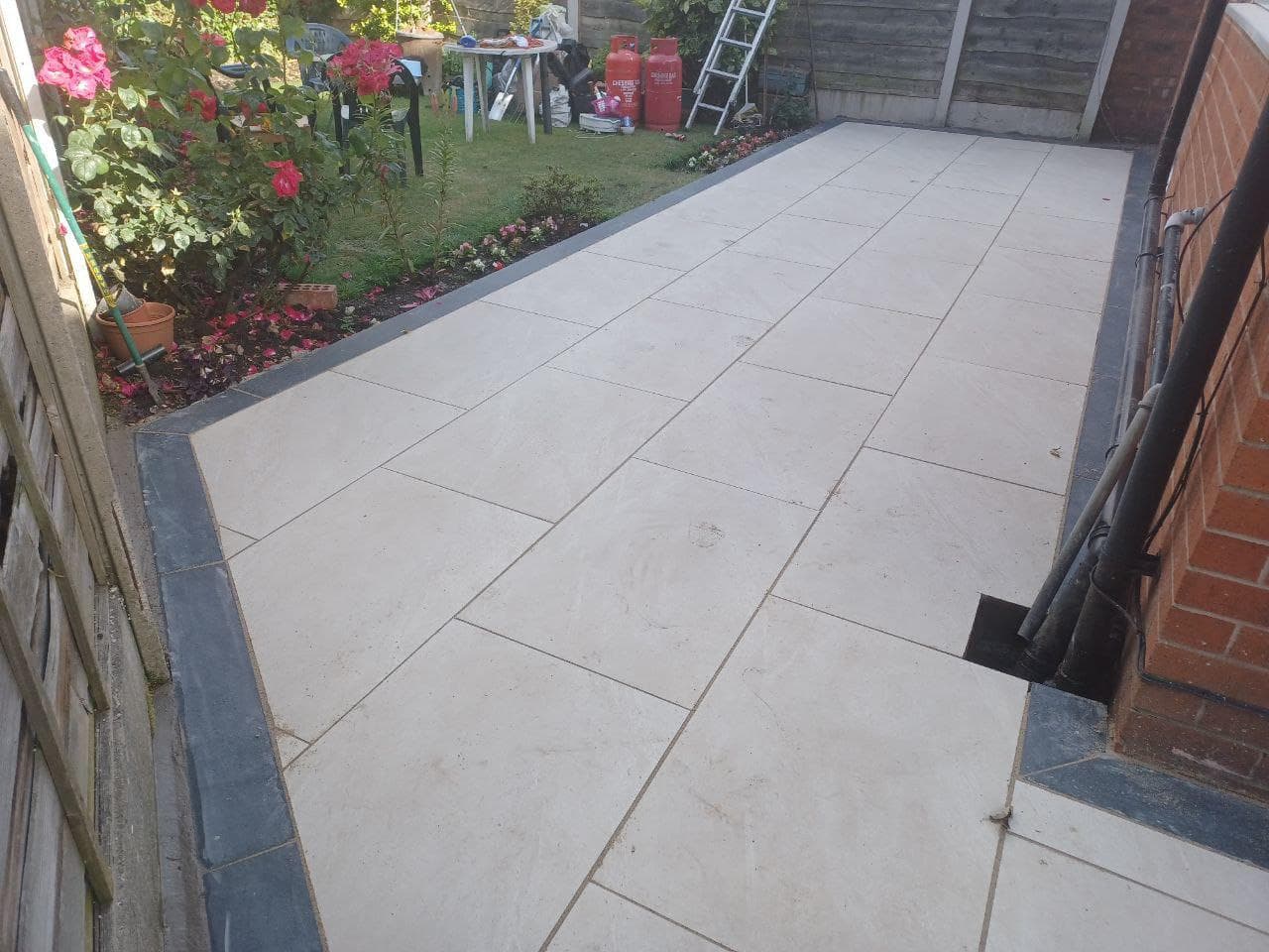 Porcelain paving running the length of a rear garden